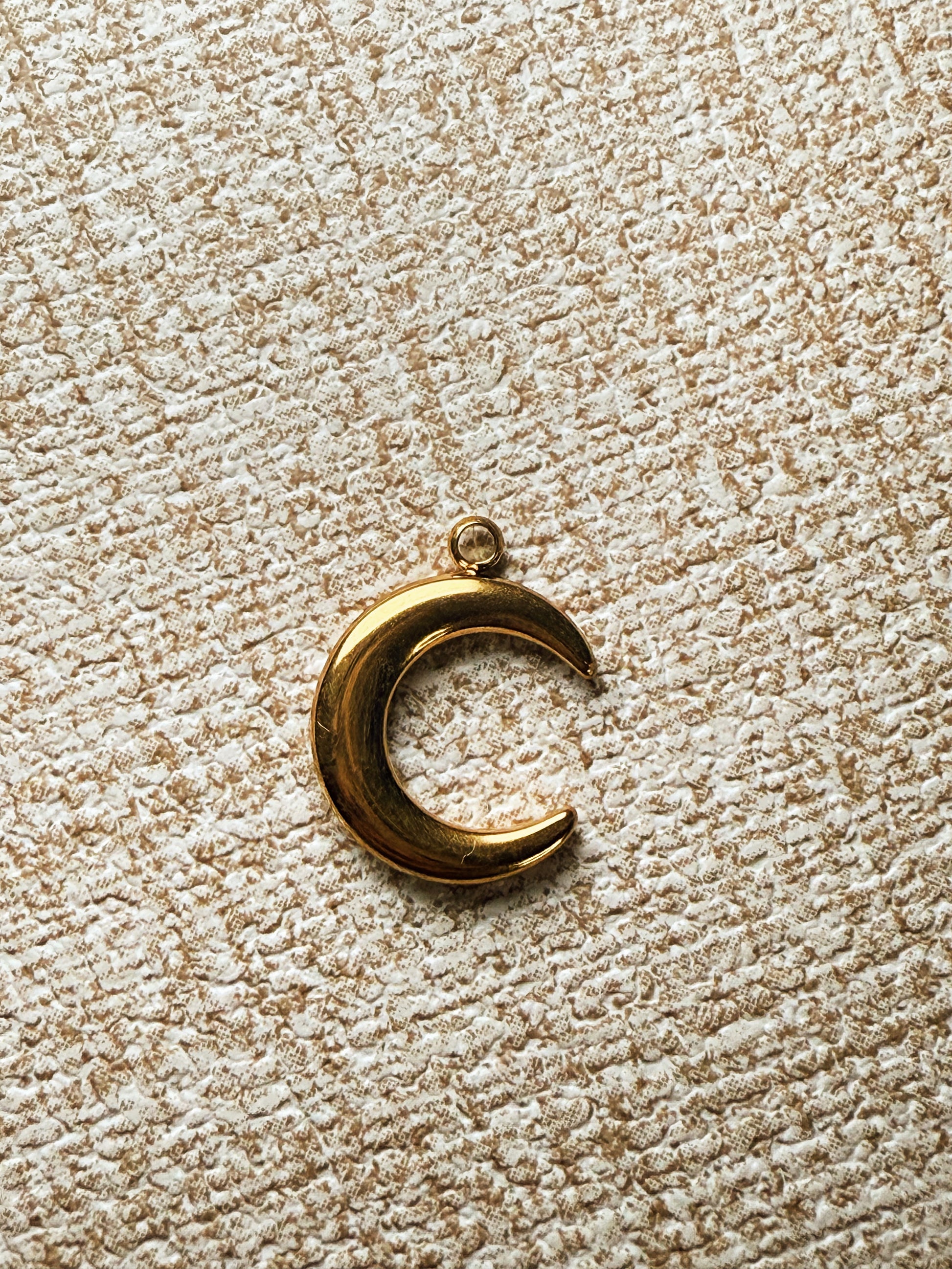 charm de luna en acero inoxidable