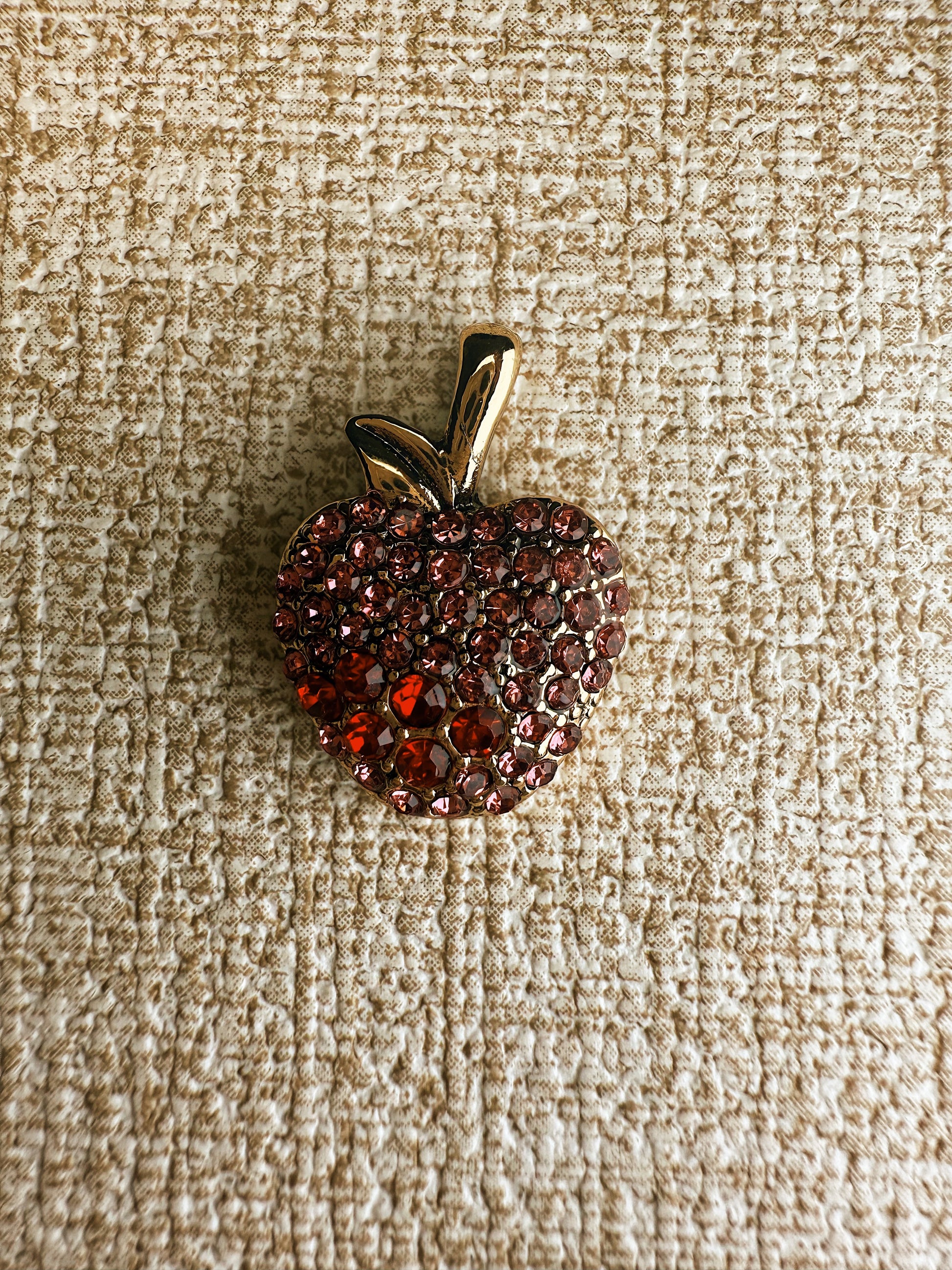 dije de manzana