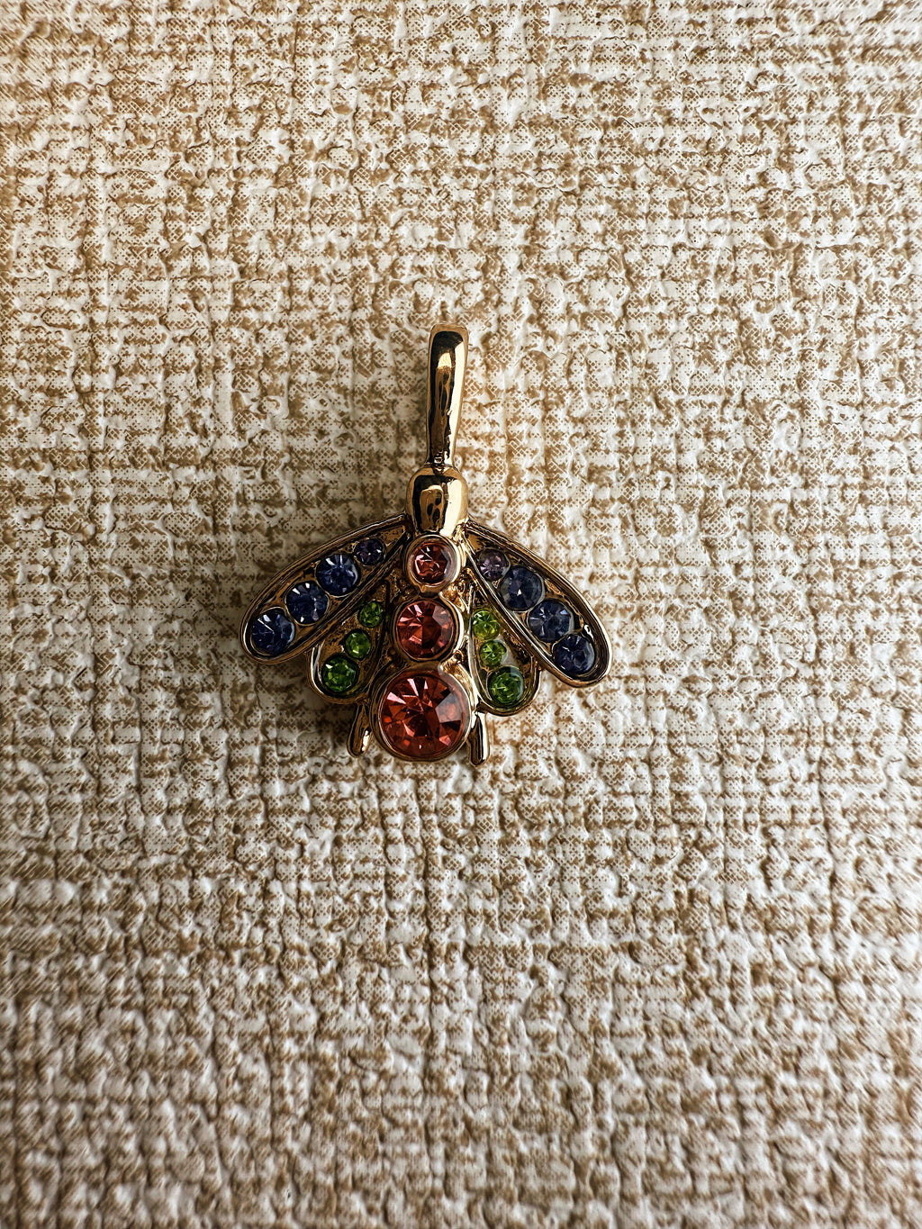 dije de mariposa
